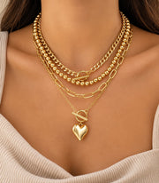 SET DE 4 COLLARES DORADOS PARA MUJER CON DIJE DE CORAZÓN