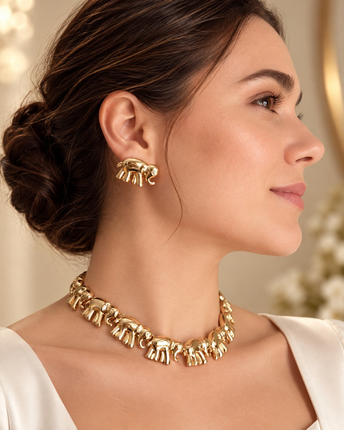 Set de collar y Aretes de Elefante Dorados
